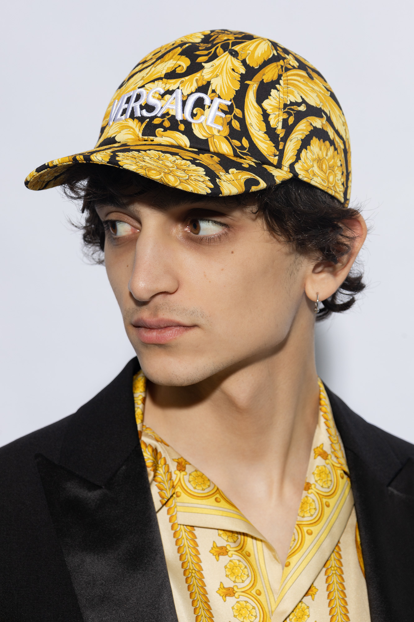 Versace store hat gold